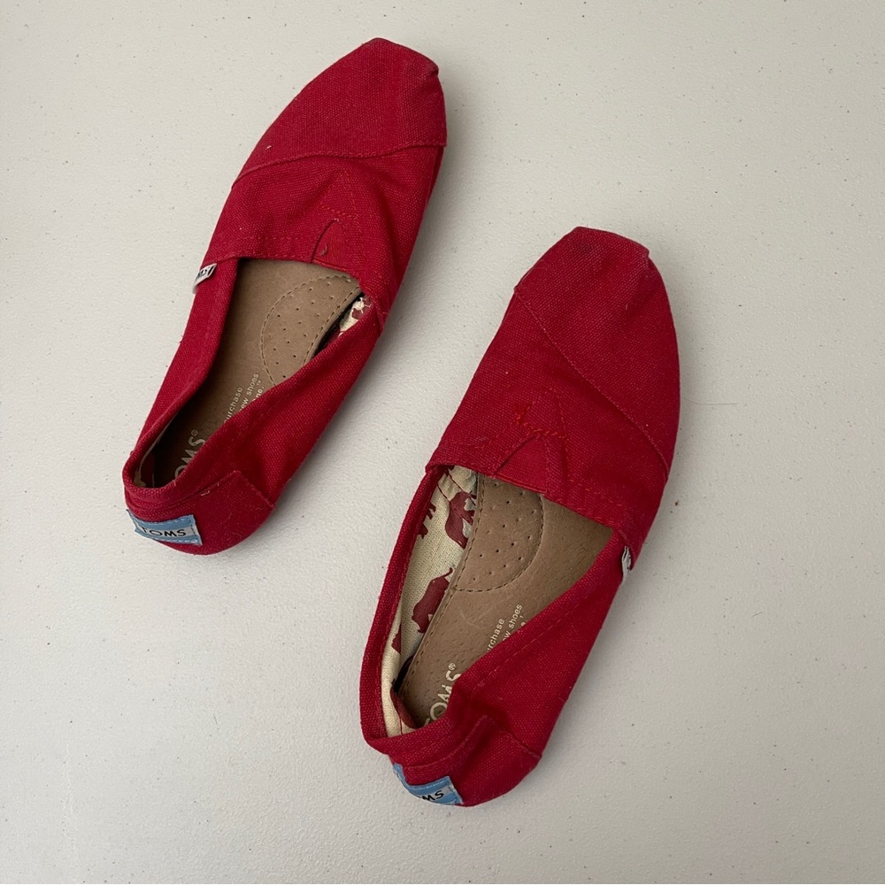 Toms red slip on shoes size 6